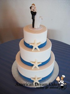 white wedding cake with starfish