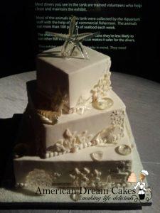 Square wedding cake with seashells