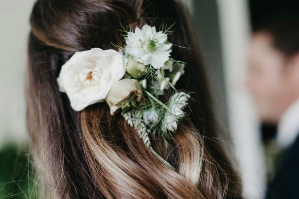 Boho wedding hairstyle with flower aand rustic elements