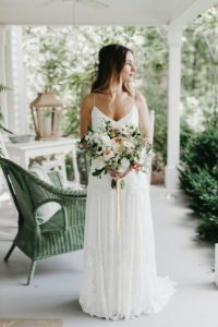 Bohemian wedding gown with boho bouquet from local flower farmer