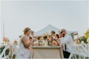 Boho outdoor beach reception wedding party head table